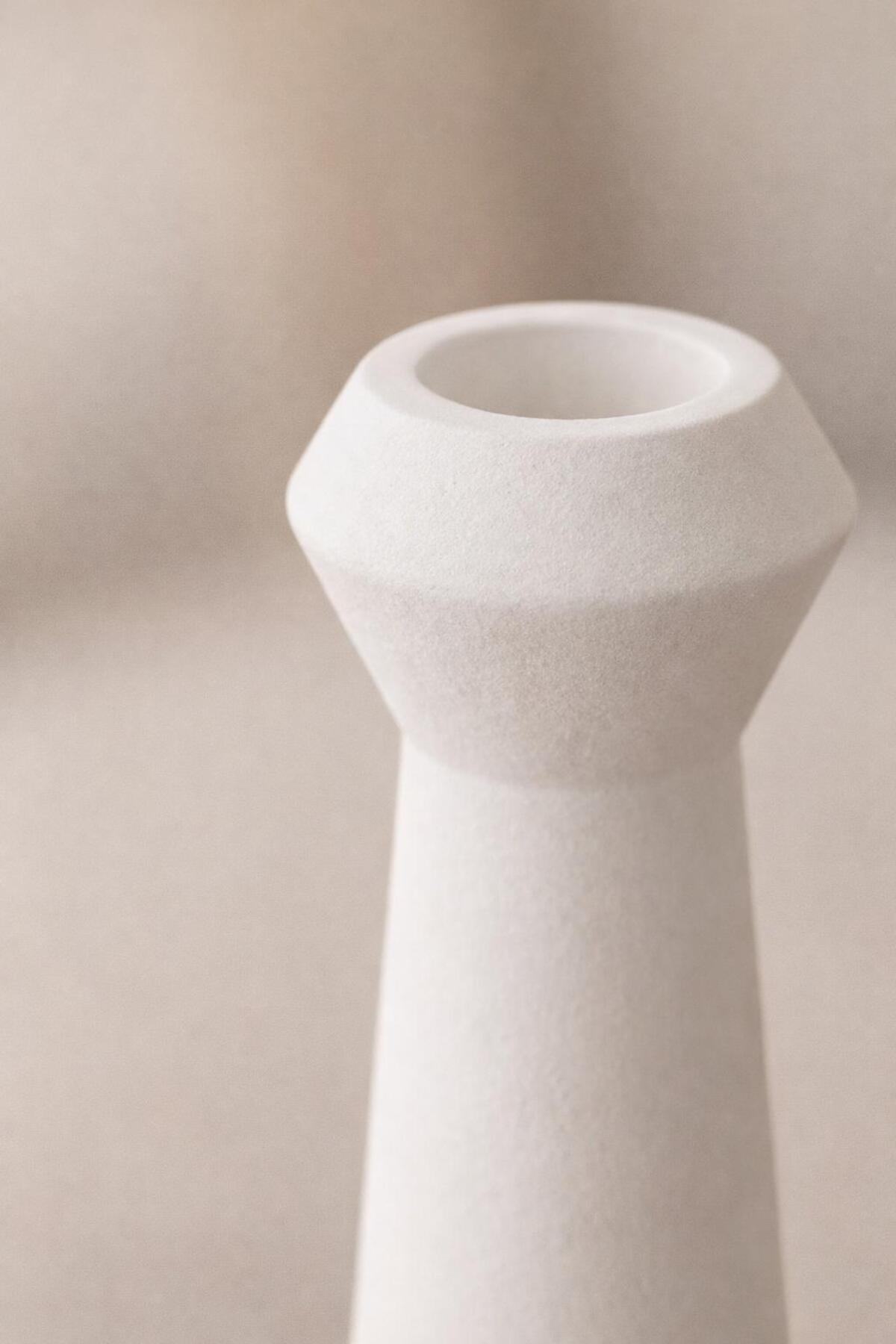 White ceramic candle holder close-up