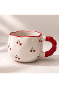 Handmade ceramic cherry mug with red handle