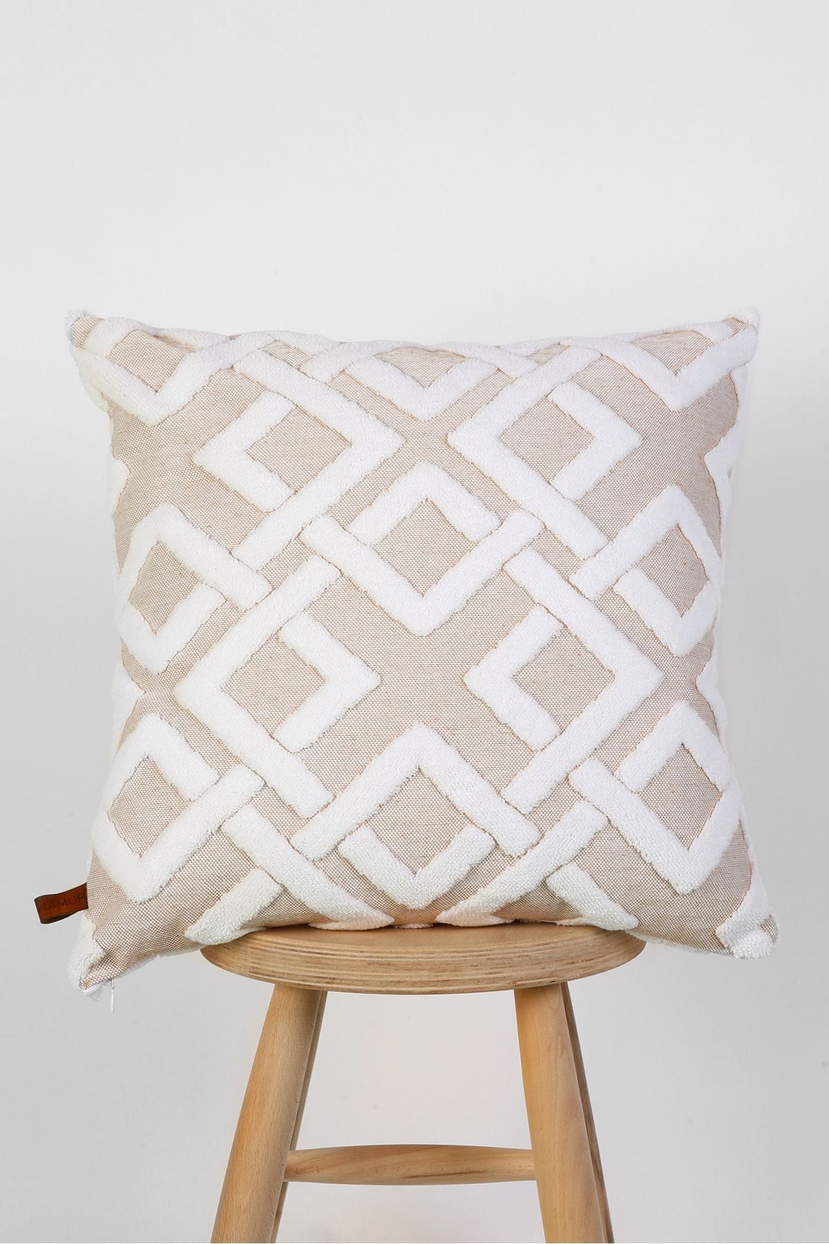 Beige lattice cushion on a stool