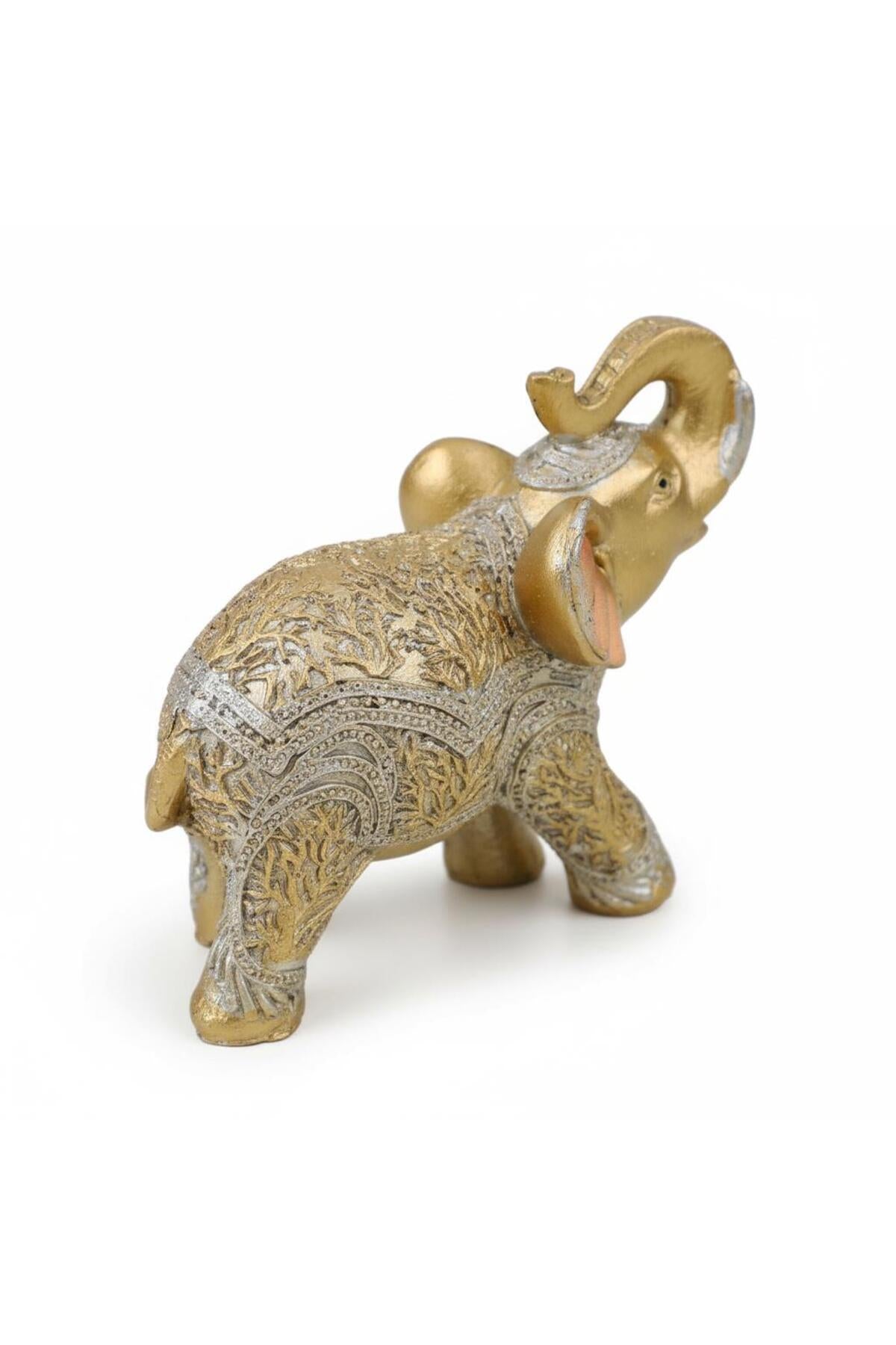 Gold elephant figurine side view
