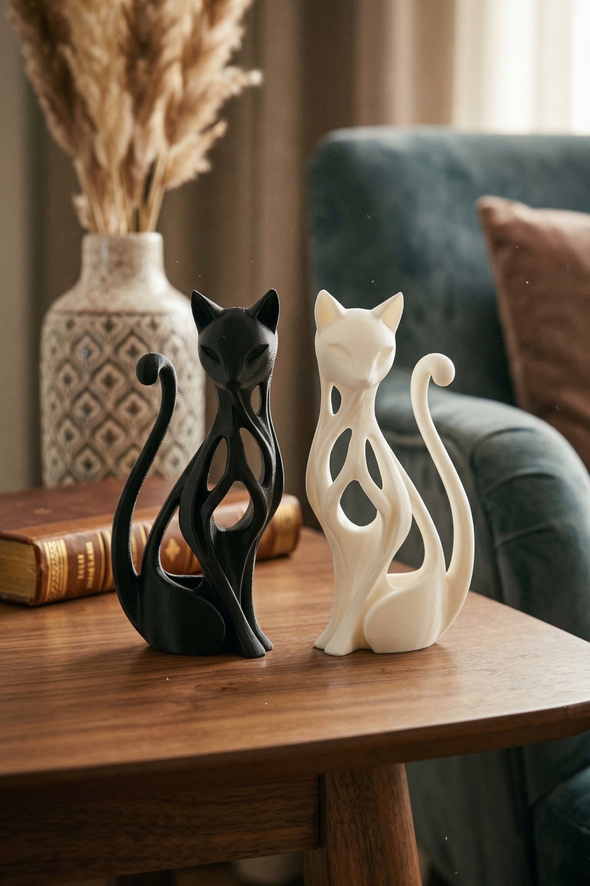 Cat figurines on a shelf