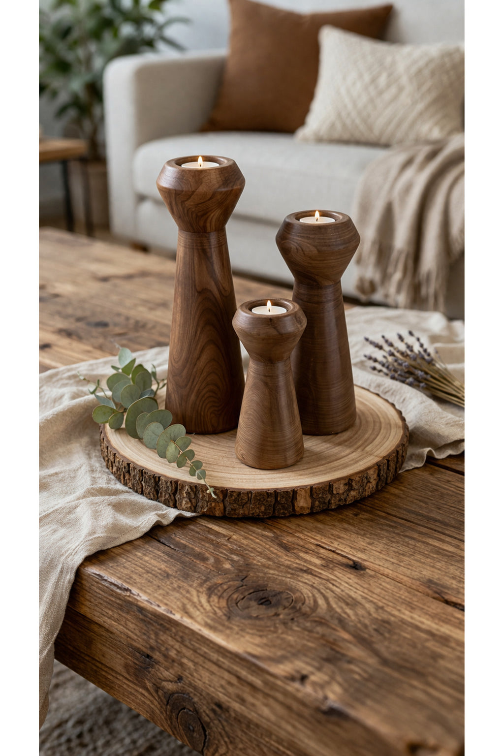 Brown candle holders on a wooden table