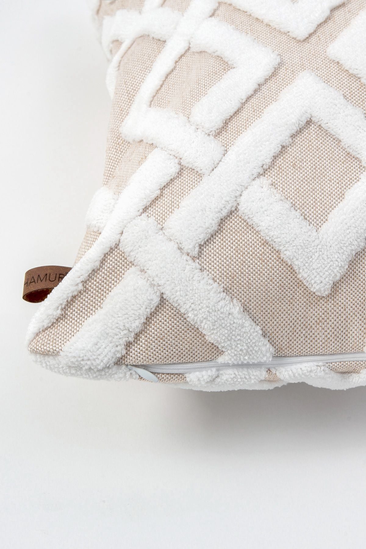 Beige lattice tufting detail