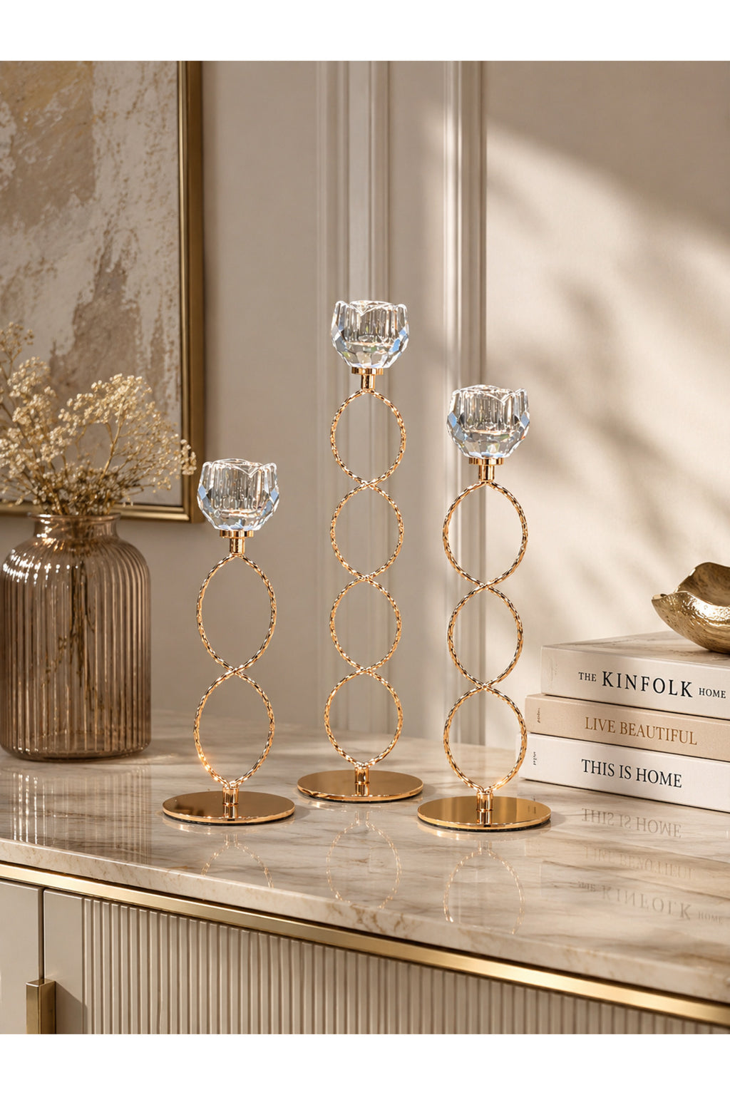 Gold candle holders on a table